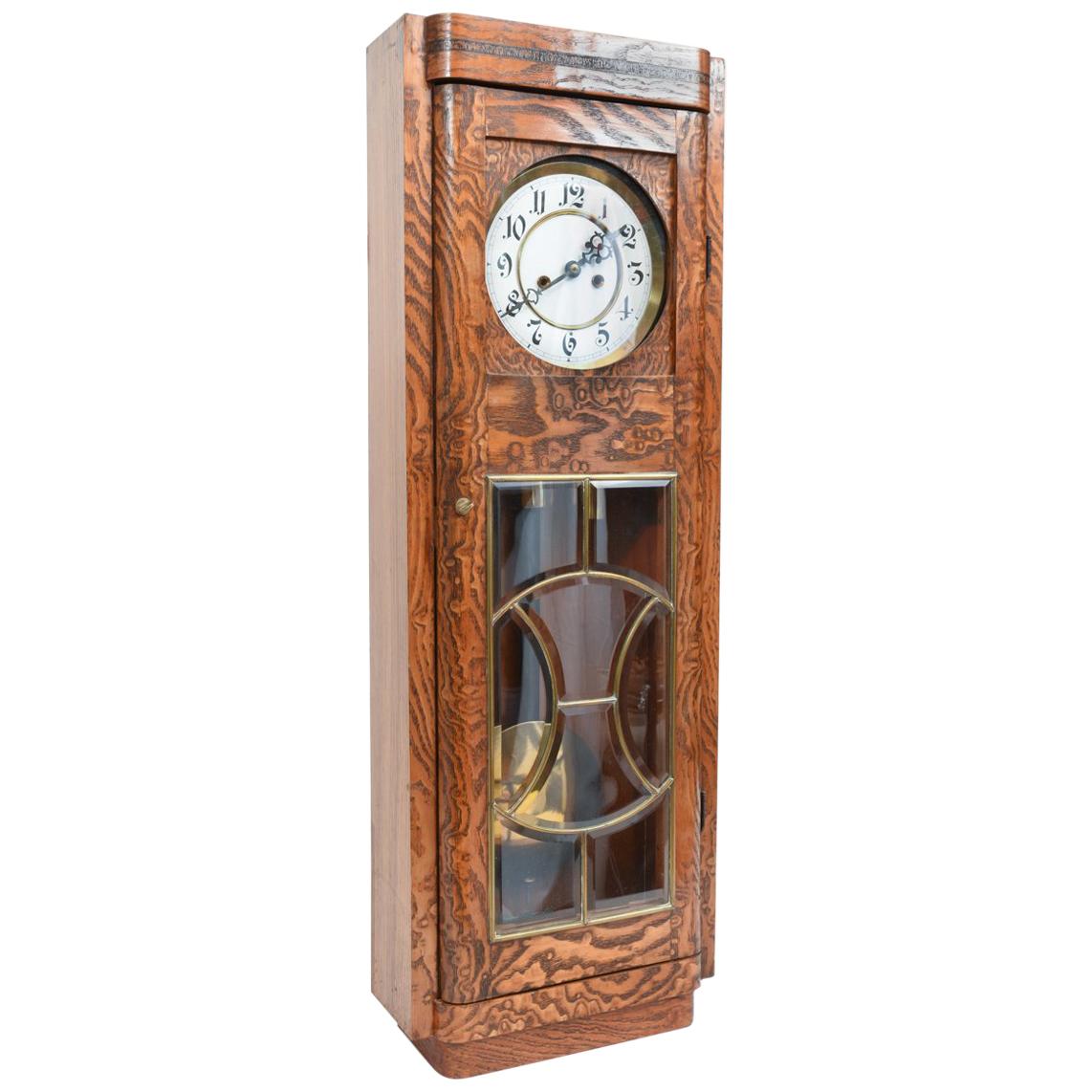 Tiger Oak Case Beveled Glass Trimmed Brass Wall Clock