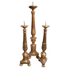 Antiguos candelabros dorados italianos