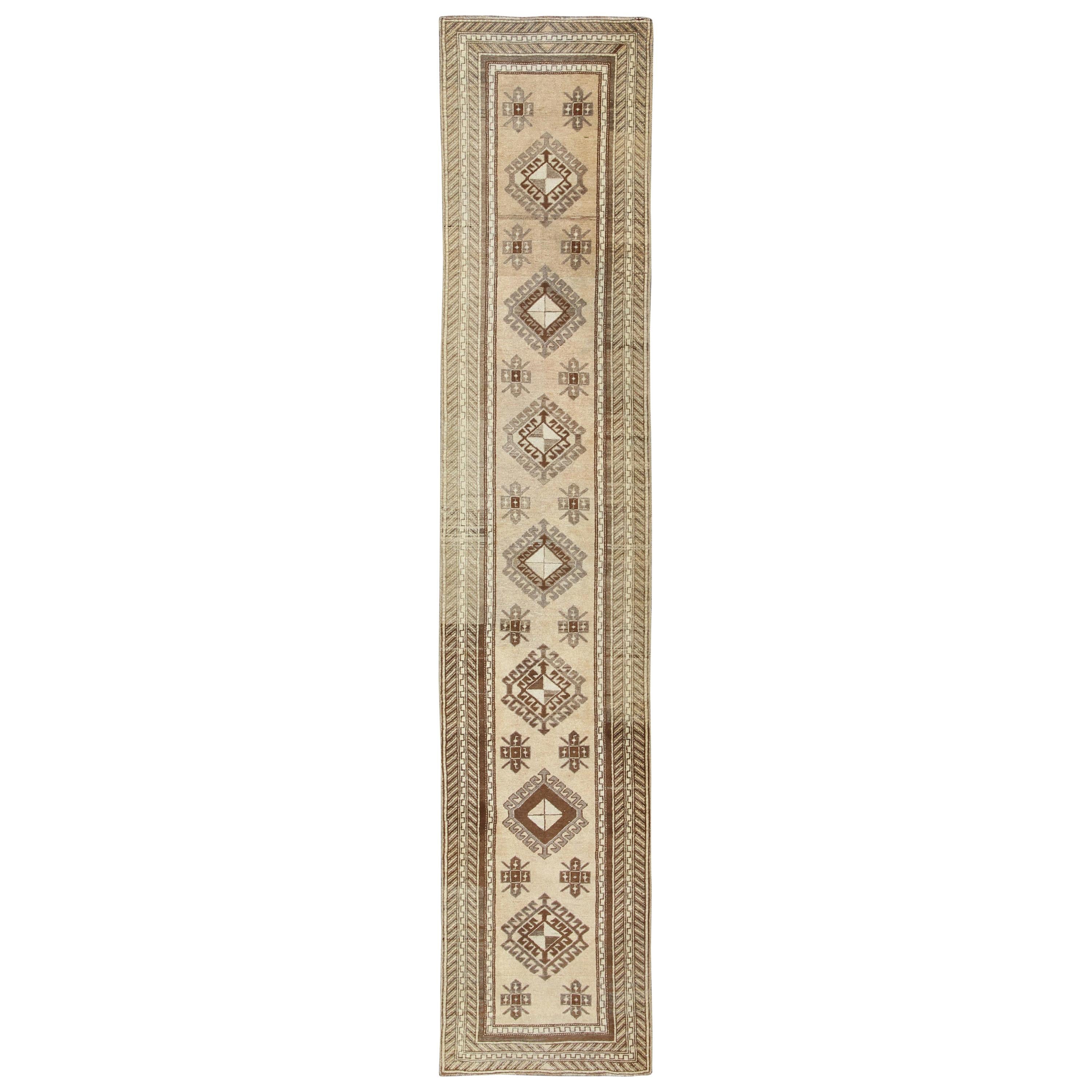 Earth-Toned Vintage Turkish Oushak Runner with Stacked Medallion Design For Sale