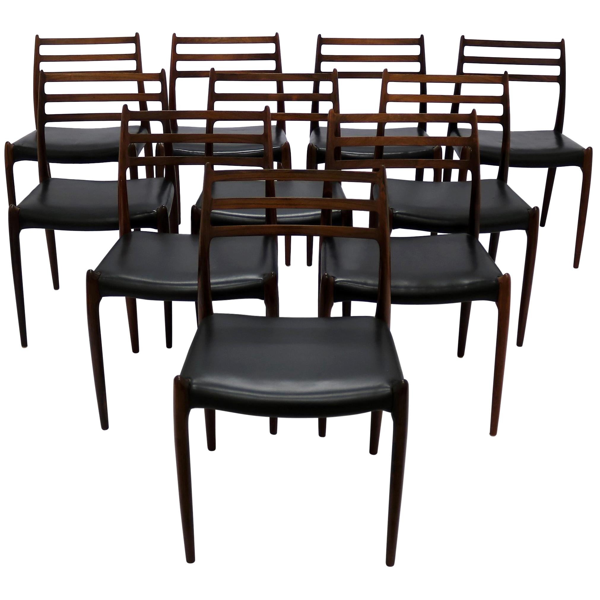 N.O. Moller, 10 Dining Chairs in Rosewood and Black Leather, Scandinavian Modern
