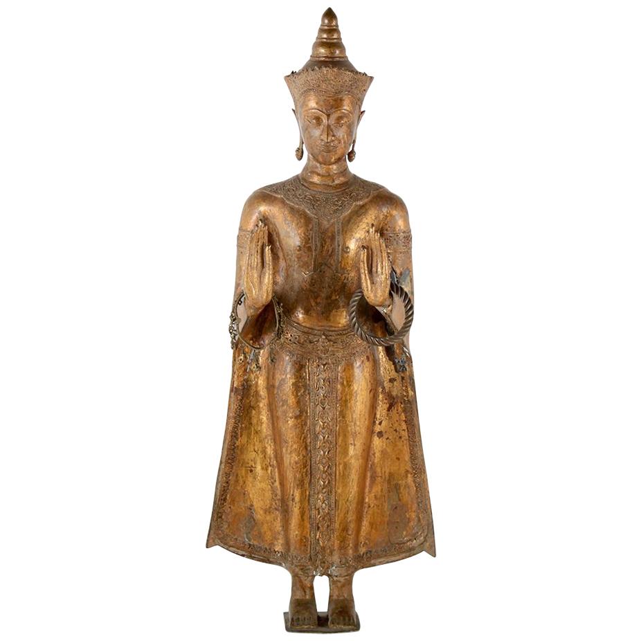 Gilt Bronze and Gesso Standing Buddha Figure