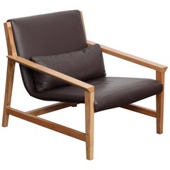 Angular Solid Maple Frame Lounge Chair Clad in Chocolate Brown Leather