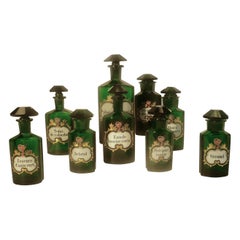 Antique Collection of 19th Century Green Cut Glass Apothecary Bottles