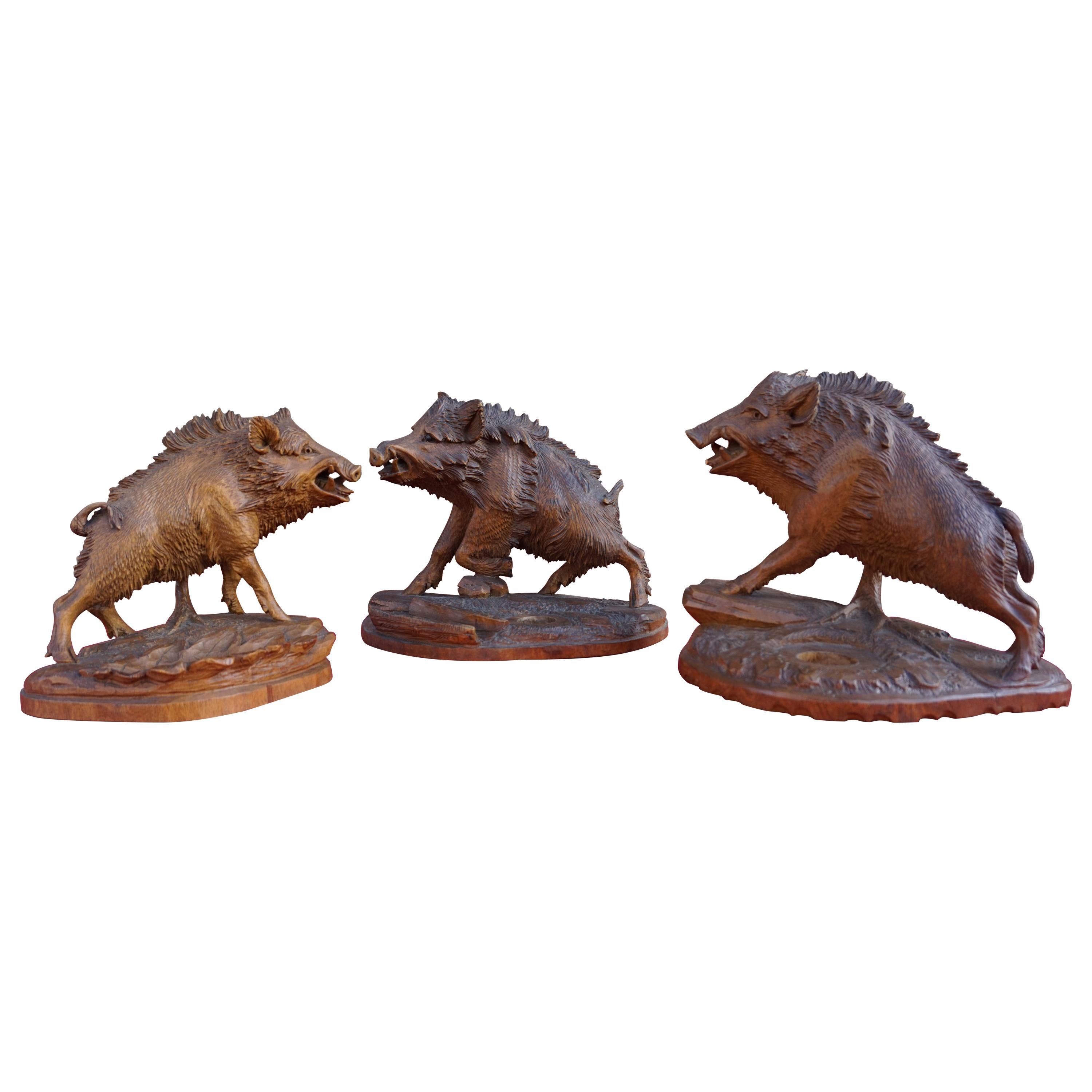 Group of Three Hand Carved Swiss Black Forest Wild Boar Sculptures by N. Deneffe