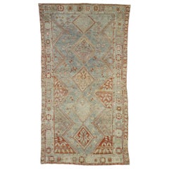Antique Persian Shiraz Rug with Faded Earth-Tone Colors