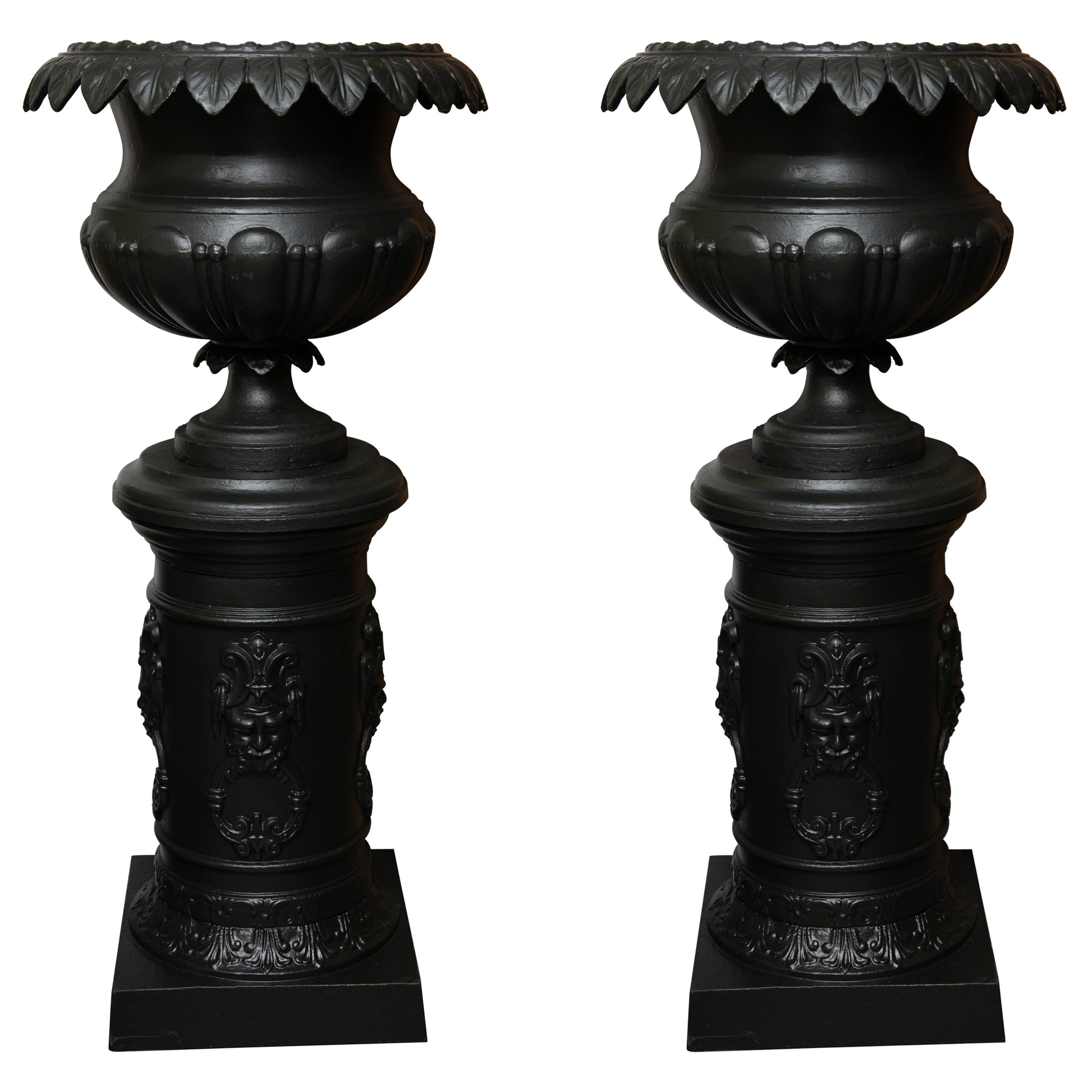 Late 19th Century Pair of Victorian Cast Iron Urns on Pedestals - Pair. 