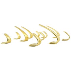 Set of 11 Midcentury Brass Wall Hooks Attributed to Carl Auböck, Austria, 1950s