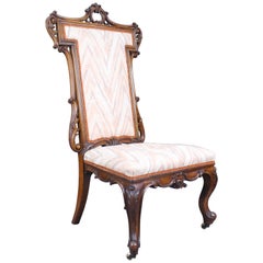 Elegant Victorian Carved Walnut Nursing Chair
