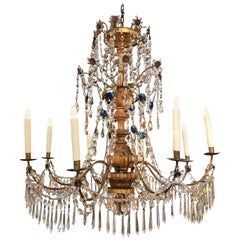 Early 20th Century Italian Carved Gilt Wood and Crystal Eight-Light Chandelier