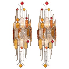 Paire d’appliques sculpturales en métal et verre sculpté