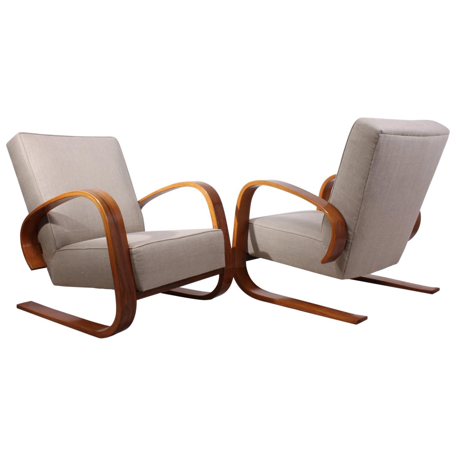 Pair of Walnut Armchairs by Alvar Aalto, circa 1950