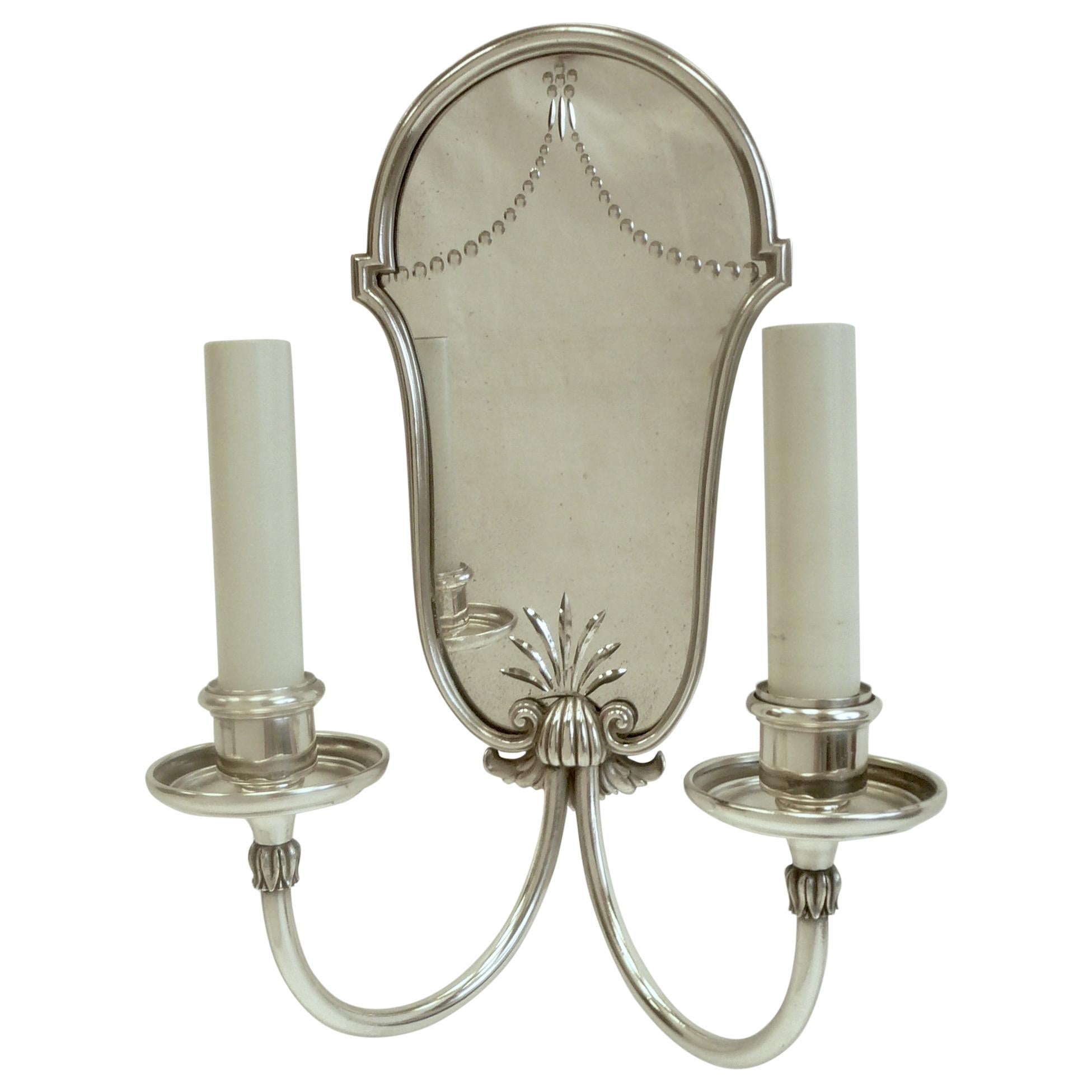 Set of Four Mirrored Back Silver Plated Two-Light Sconces by E. F. Caldwell