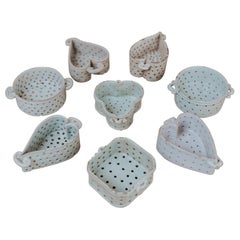 Colección de moldes de porcelana para queso