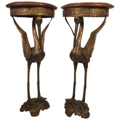 Pair of Crane Motif Burnished Bronze Pedestal Tables