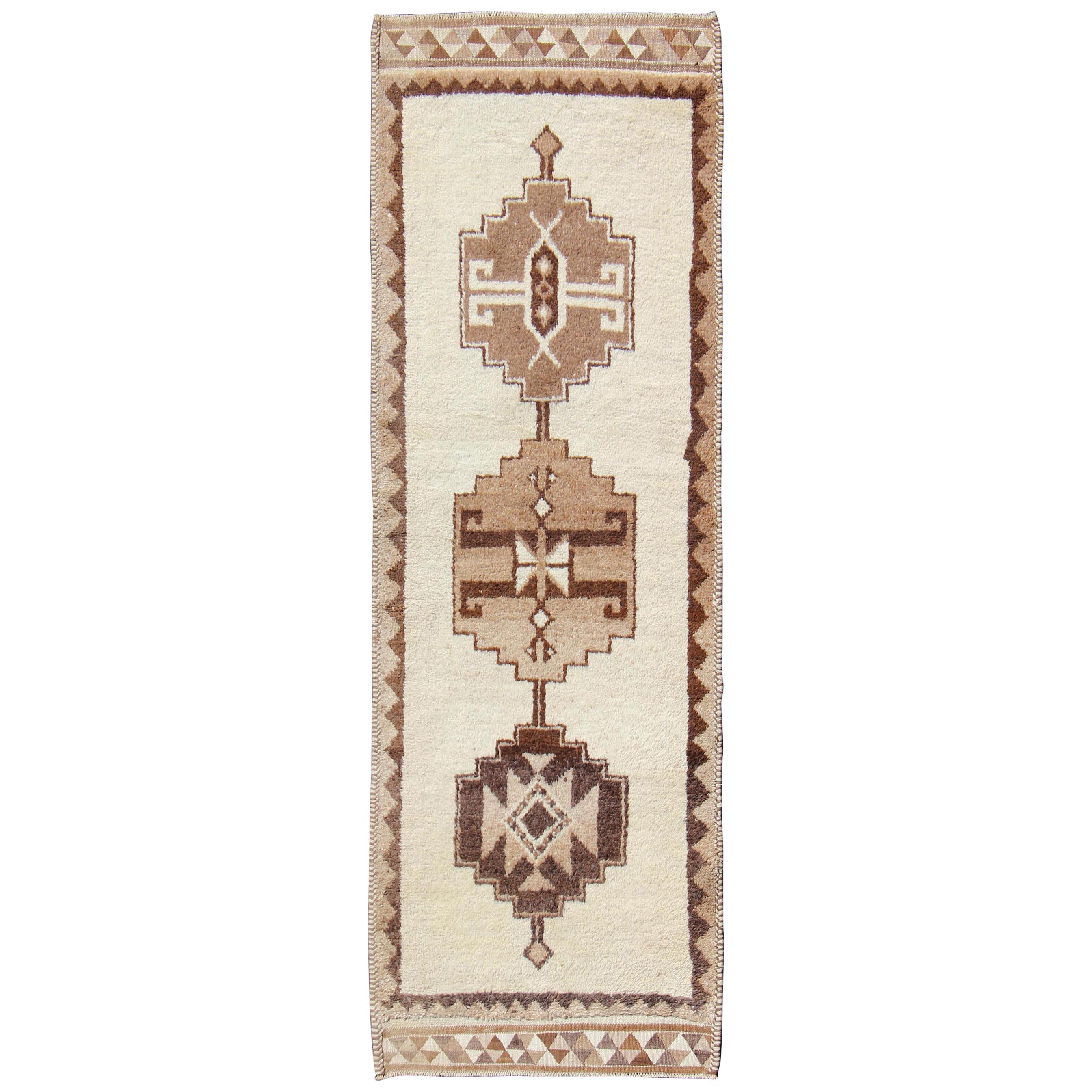 Vintage Turkish Tulu Gallery Rug with Tribal Motifs in Shades of Brown and Cream For Sale