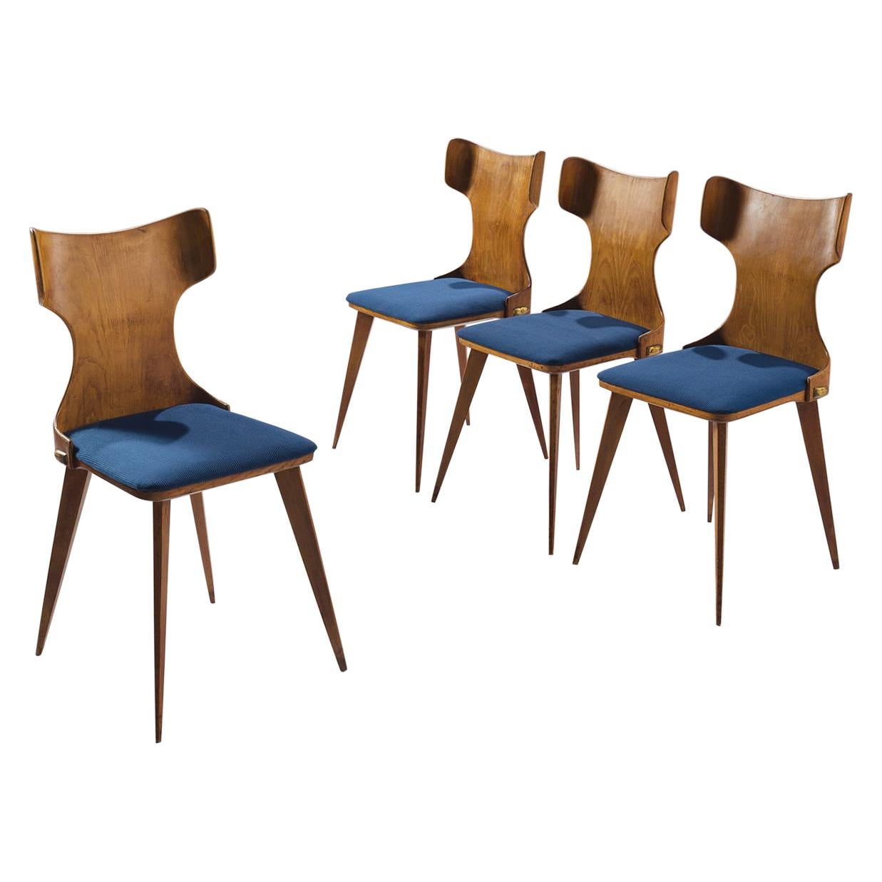 Carlo Ratti Four Bent Wingback Dining Chairs