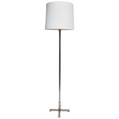 Elegant Pair of Brushed Steal and Solid Brass Floor Lamps by Maison Jansen