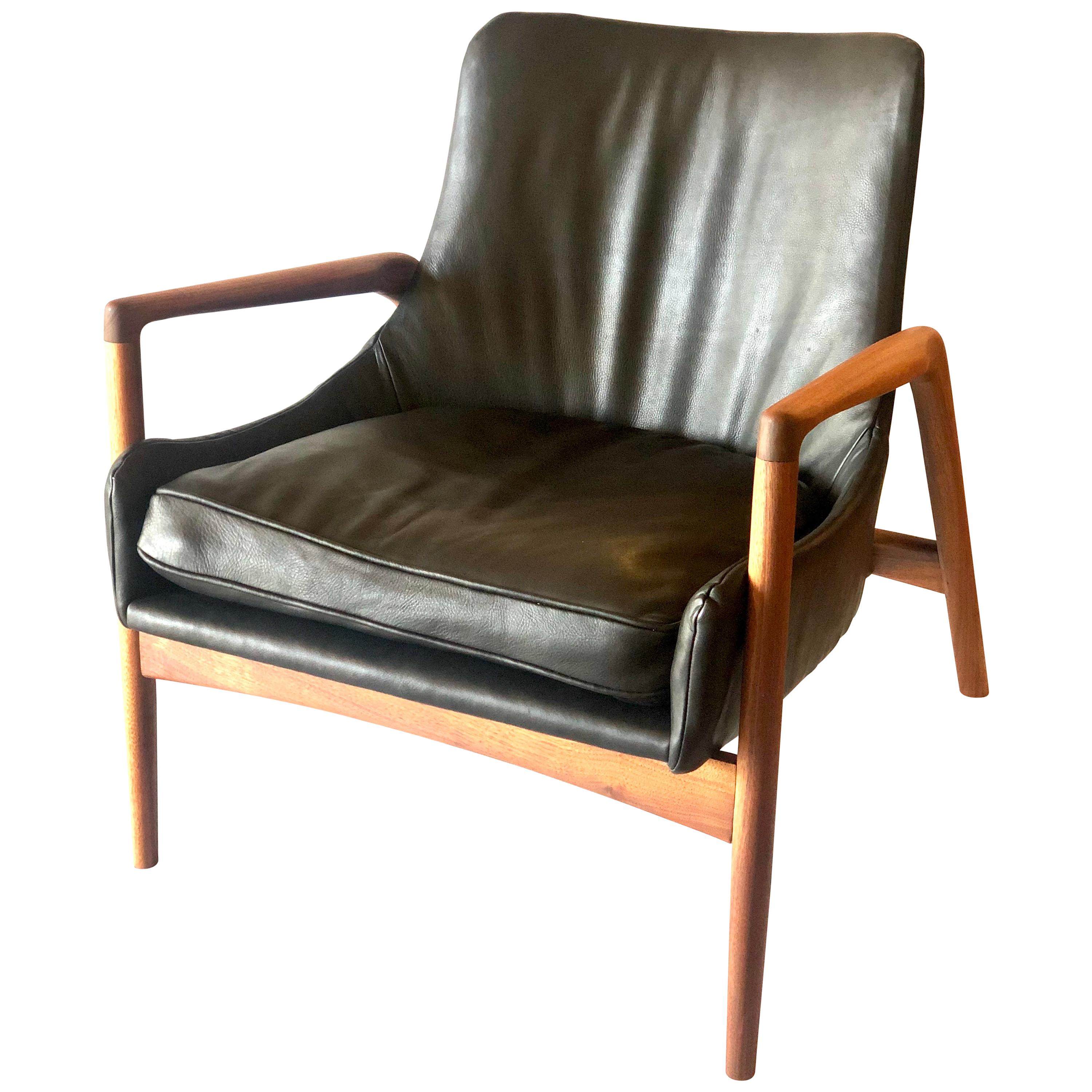 Danish Modern Leather and Walnut Lounge Armchair by Kofod Larsen