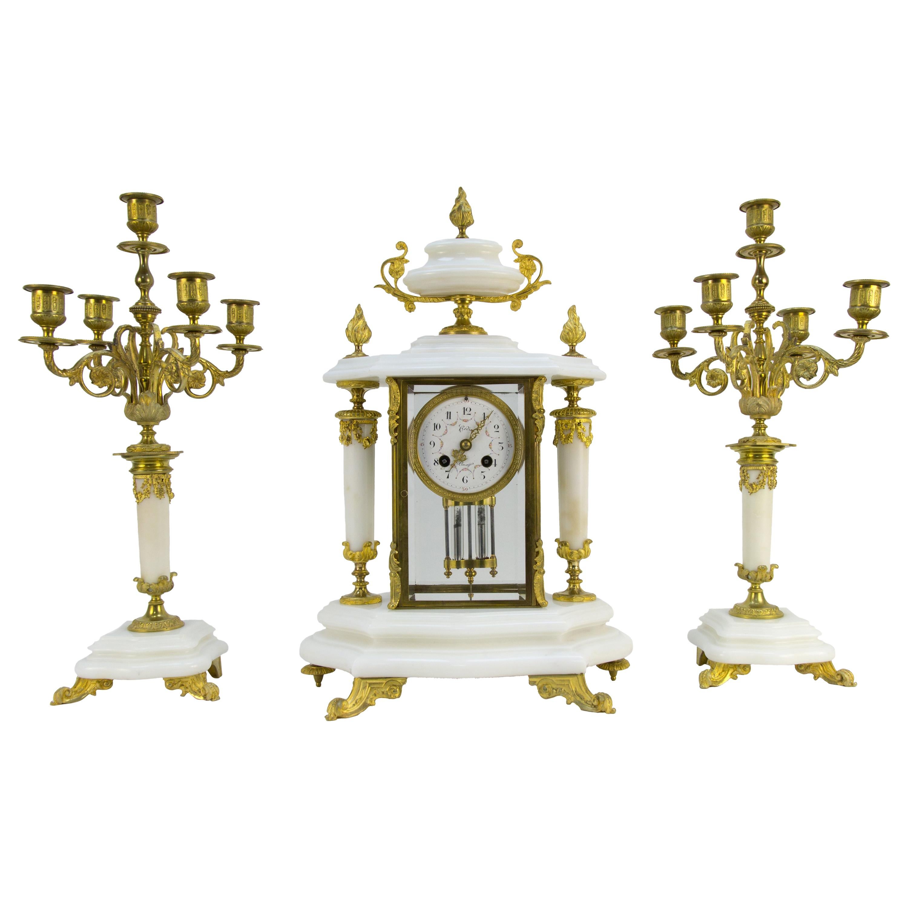 French Ormolu and White Marble Mantel Clock and Candelabra Set by A.D. Mougin