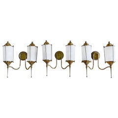 Set di tre applique d'epoca a doppia luce in ottone del XX secolo