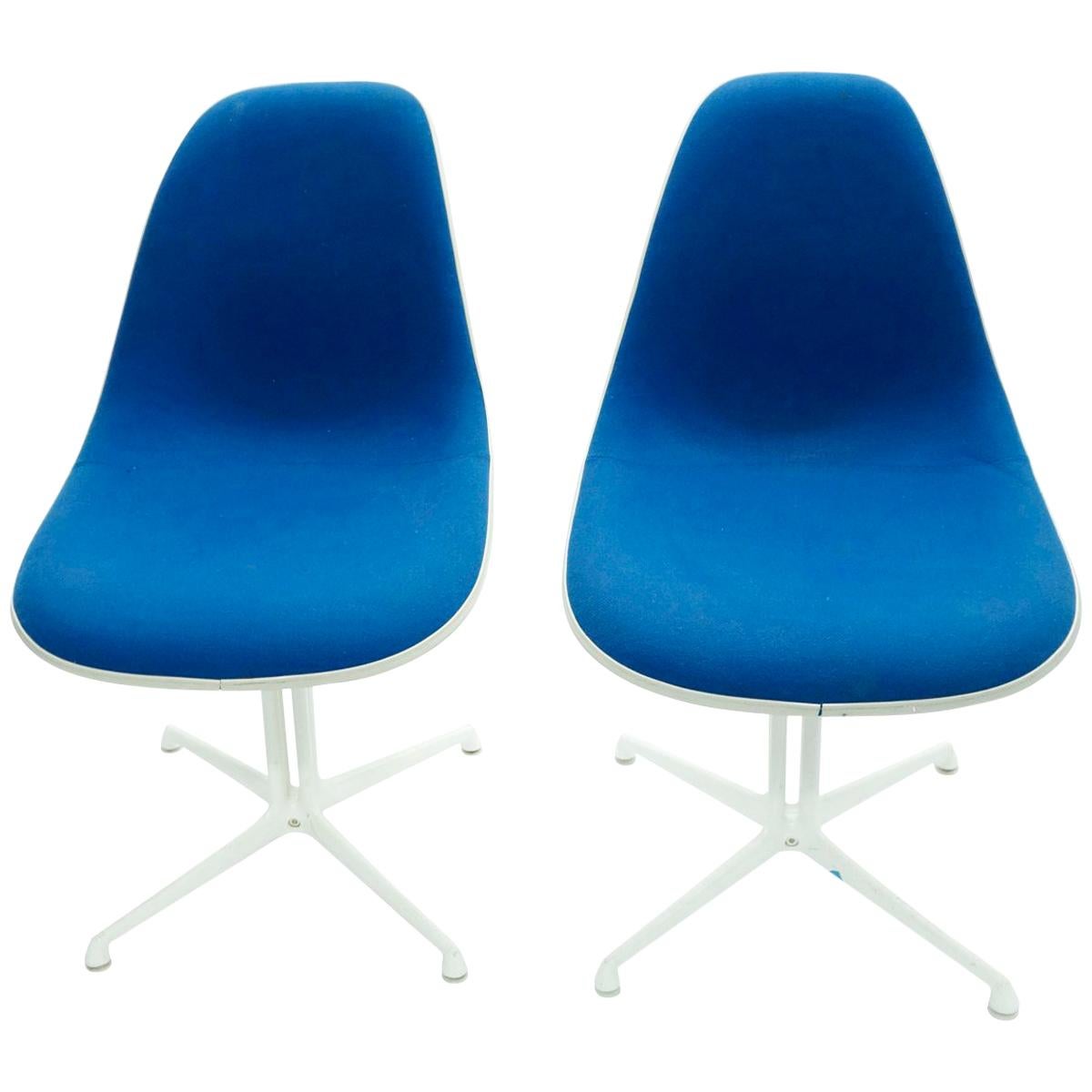 Pair of Charles and Ray Eames La Fonda Chairs with Cream White Fiberglass Shells