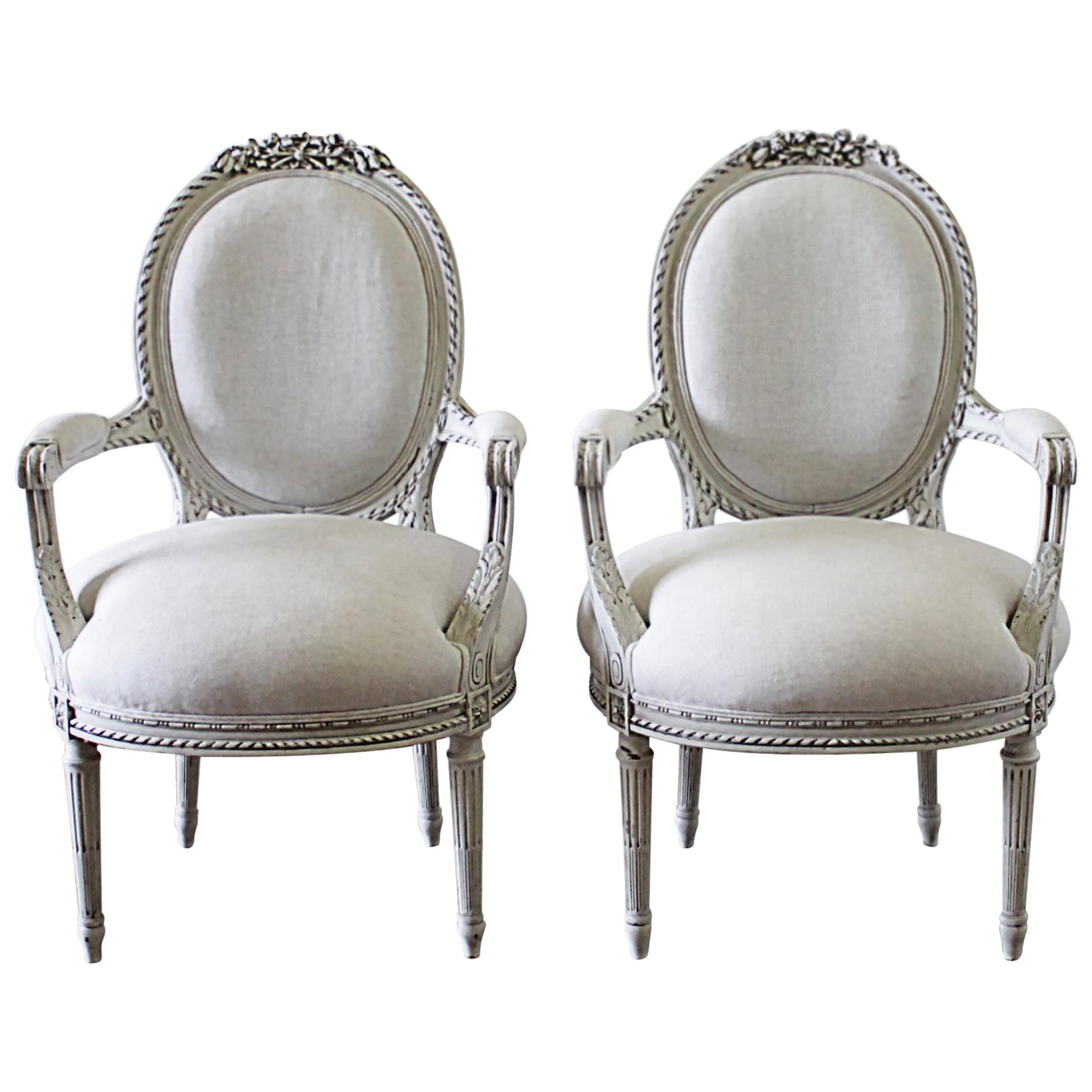 Early 20th Century Carved and Painted Louis XVI Style French Open Arm Chairs