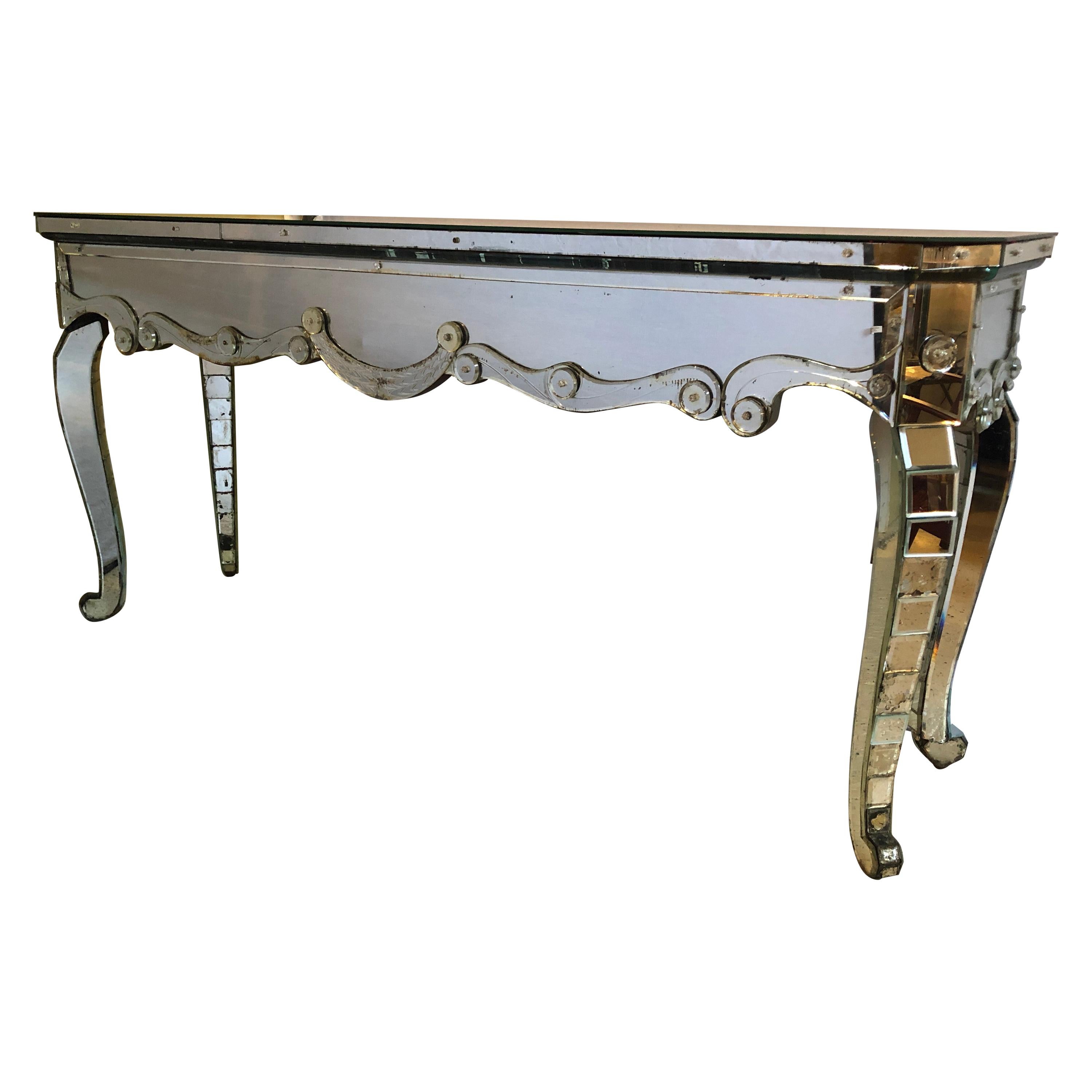 Hollywood Regency Mirrored Console with Applied Decoration and Cabriolet Legs For Sale