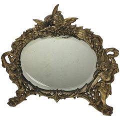 National Bronze and Iron Works Gilded Iron Mirror with Putti
