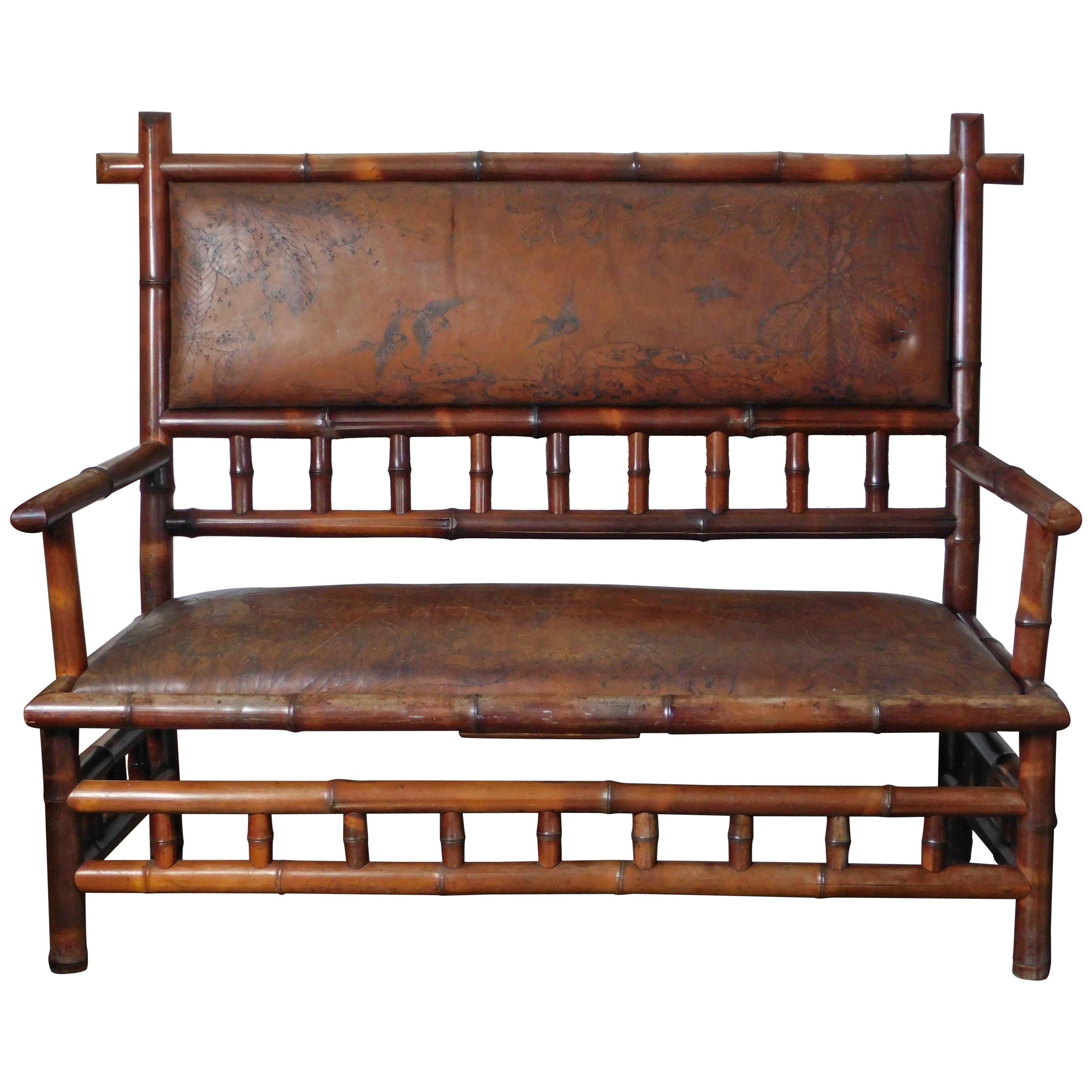 19th Century Perret Vibert Bamboo Settee with Decorated Leather Upholstery For Sale