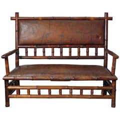 Antique 19th Century Perret Vibert Bamboo Settee with Decorated Leather Upholstery