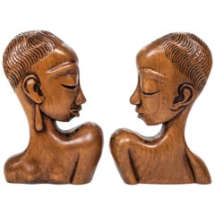 Pair of "Art Deco" Designed Carved Wood African Figures after Hagenhauer