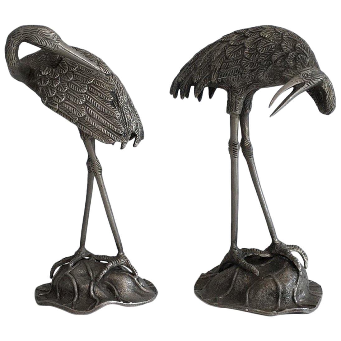 Paire de hérons en bronze argenté, attribués à la Maison Bagués, datant d'environ 1940 en vente