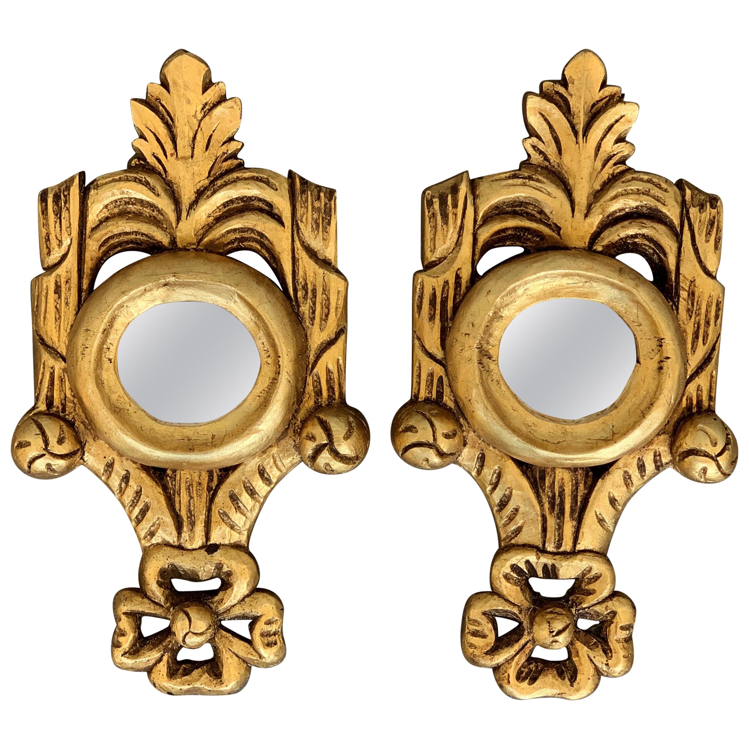 Spanish 1920s Rococo Style Carved Gold Leaf Giltwood Mirrors, a Pair
