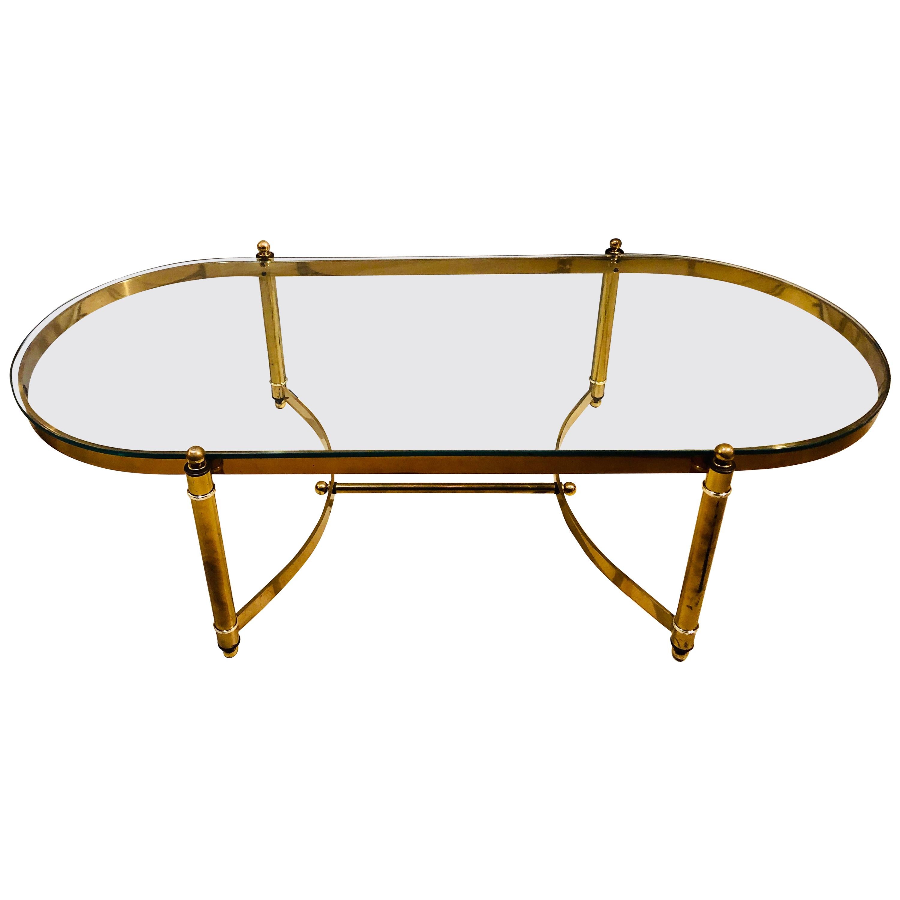 Hollywood Regency Style Heavy Brass Oval Coffee Table with a Glass Top