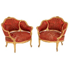 Pair of Louis XV Style Low Bergeres Basket Shaped in Gilt Wood, circa 1880