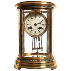 Antique Oval Four Glass Clock in Brass and Champléve by S Marti