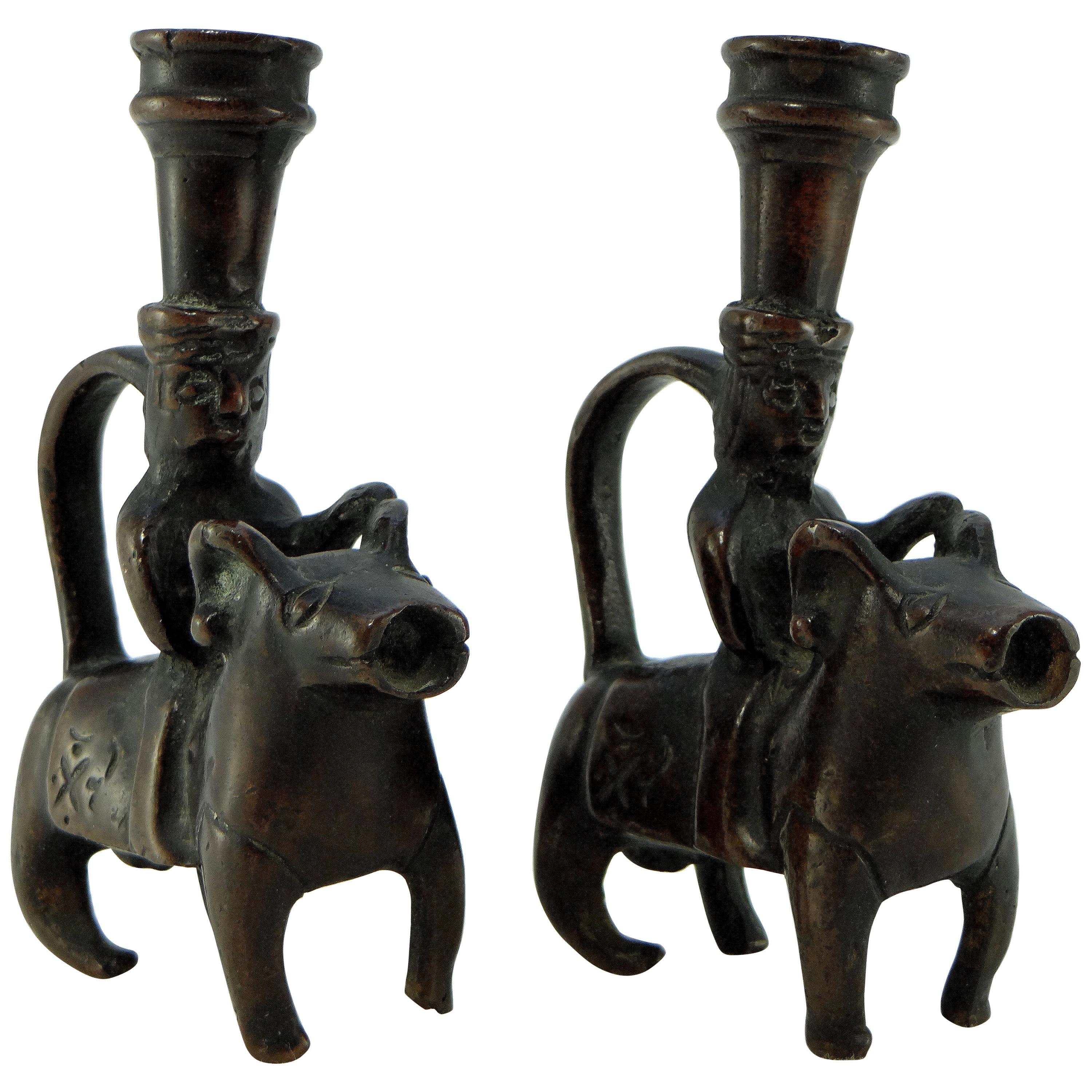 Iran 18th-19th Century, Pair of Bronze Candlesticks Characters on Rams For Sale