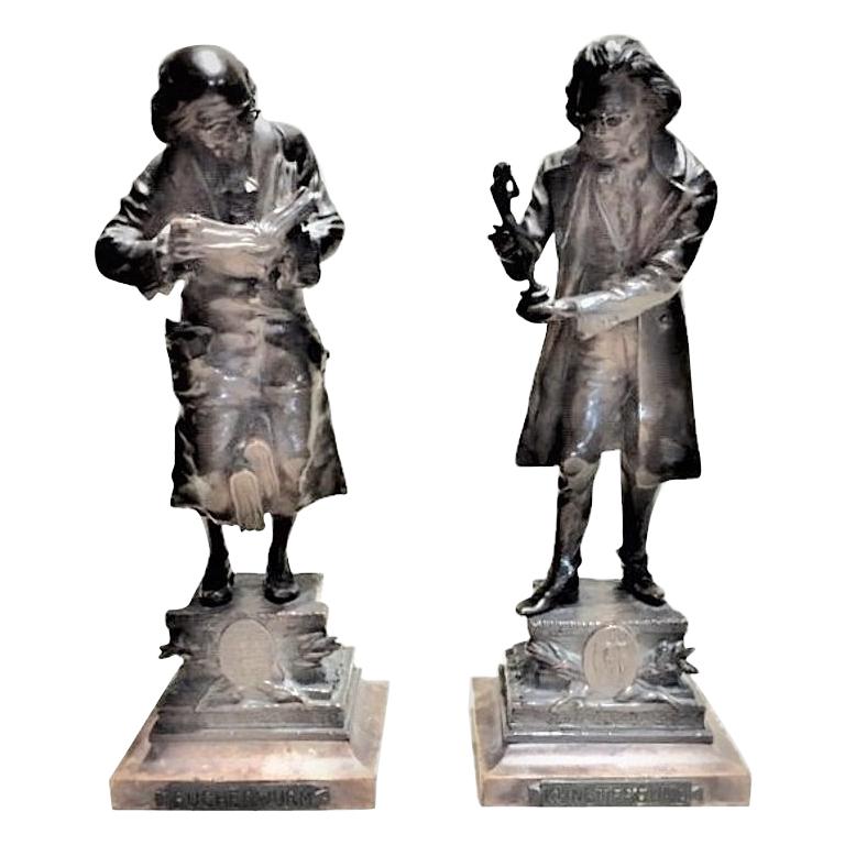 Both sculptures are signed ‘C. Kauba’ on the plinth.
Dimensions: 9.75” high x 3.75” deep x 3.5” wide
Dark brown patina.
Original marble pedestals.

Carl Kauba (Austrian, 1886 – 1922) was the son of an Austrian Shoemaker, born in 1865. He began