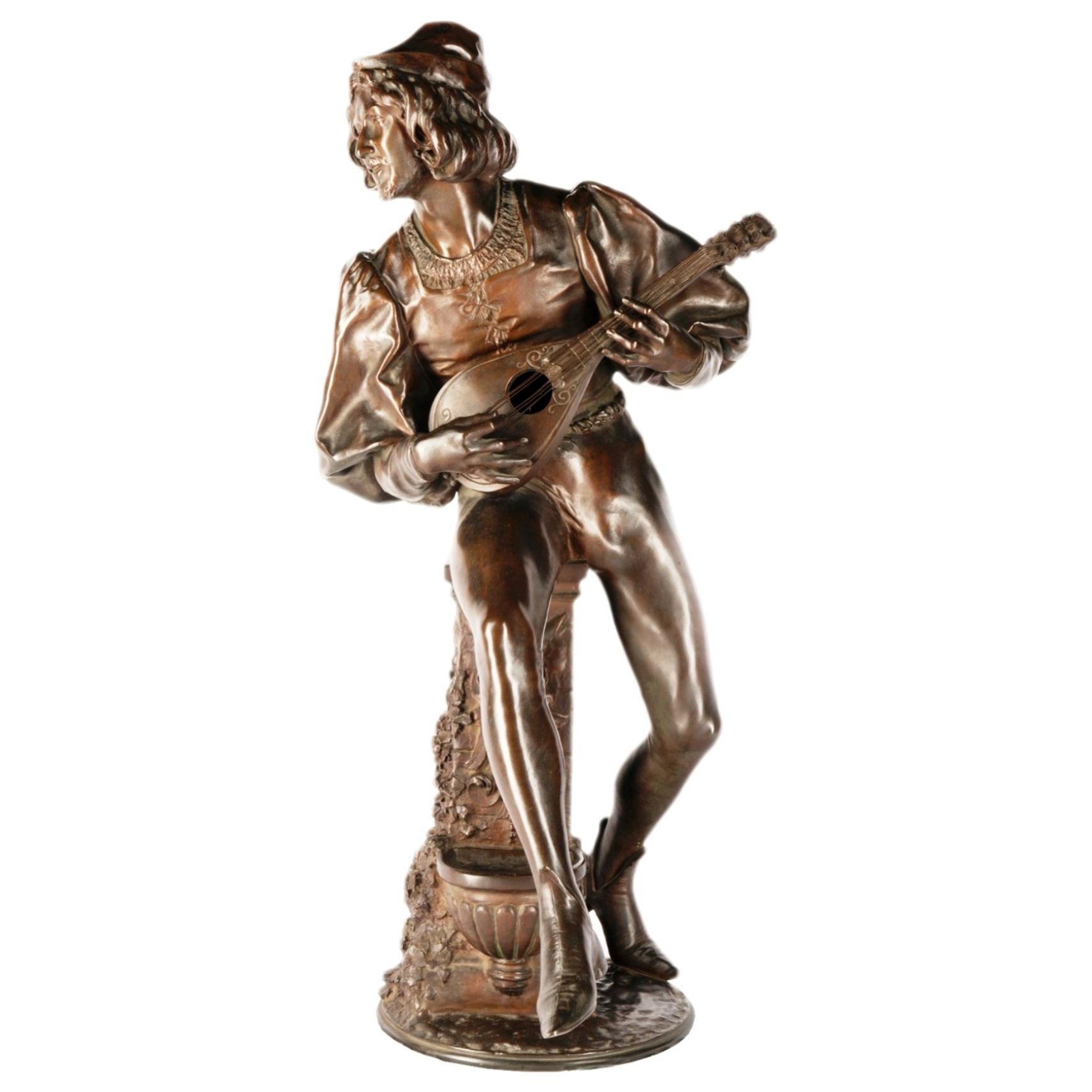 Estatua de bronce de un juglar del siglo XIX, firmada Paul Fournier