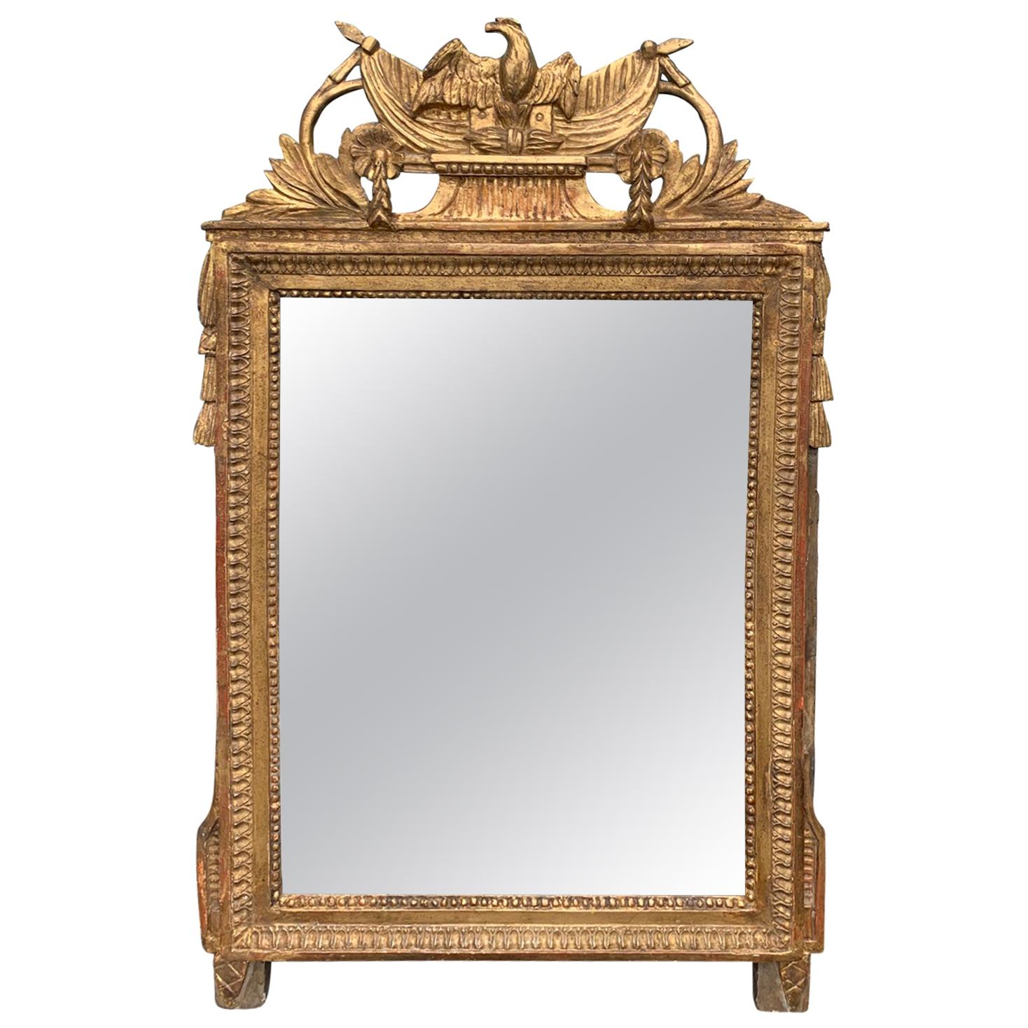 18th-19th Century Louis XVI Style Carved Giltwood Mirror with Eagle For Sale