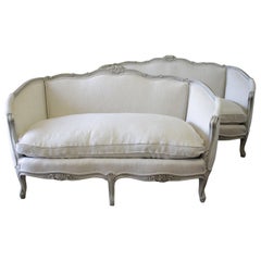 20th Century Carved and Painted Settee Upholstered in Belgian Linen