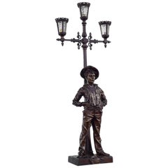 Antique Spelter Table Lamp Depicting a Youth Leaning on a Lamp Post