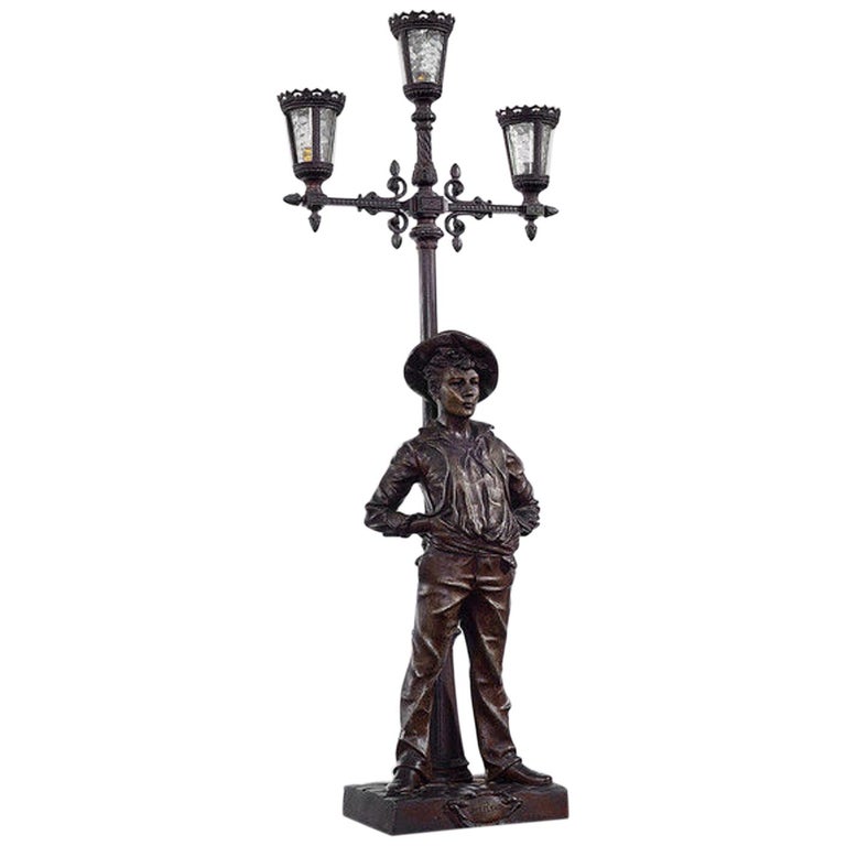 Spelter Table Lamp Depicting a Youth Leaning on a Lamp Post For Sale at