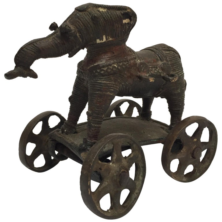 1910 toy elephant on wheels