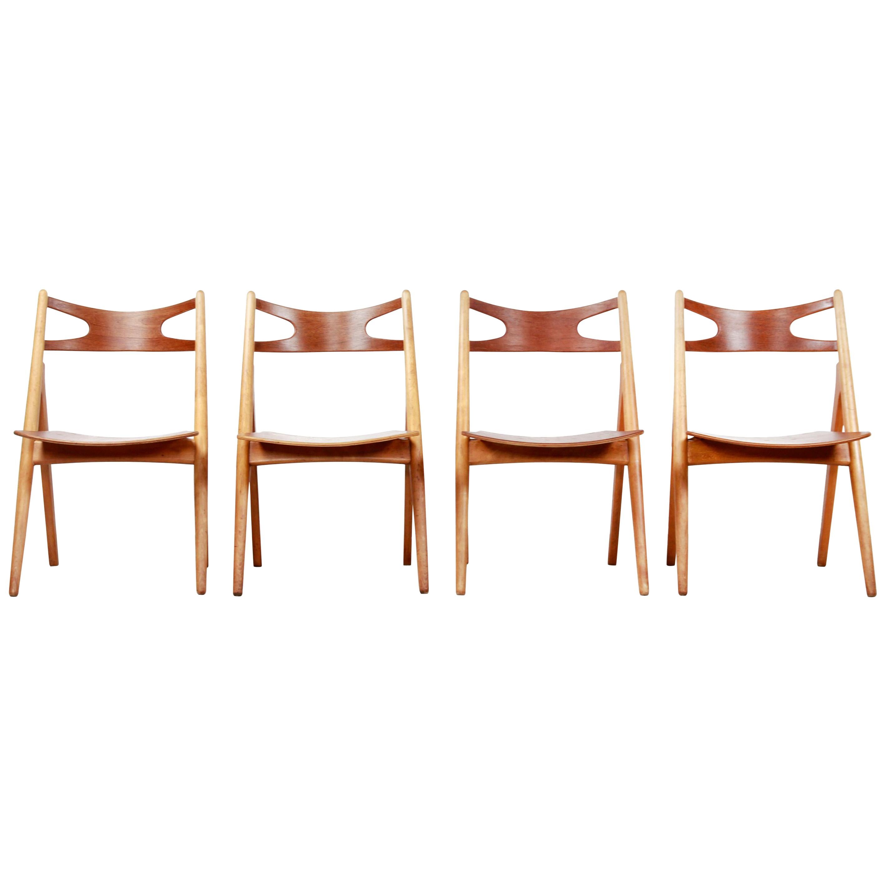Set of Four Teak Hans J Wegner Sawbuck Model CH29 Chairs by Carl Hansen