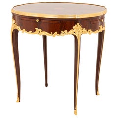 Table bouillotte de style Louis XV en bois de violette, fin du 19ème siècle