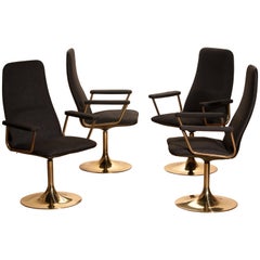 Four Golden, with Black Fabric, Armrest Swivel Chairs by Johanson Design, 1970