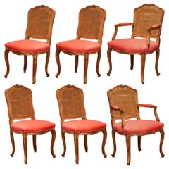 Early 20th Century French Louis XV Walnut Dining Room with Cane Back, Set of Six