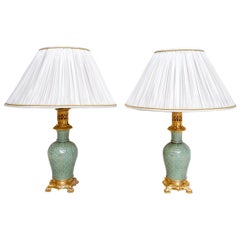 Pair of Celadon Porcelain and Gilt Bronze Lamps, 19th Century