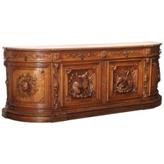 19th Century Demilune French Oak Hunt Buffet with Deep Relief Carvings